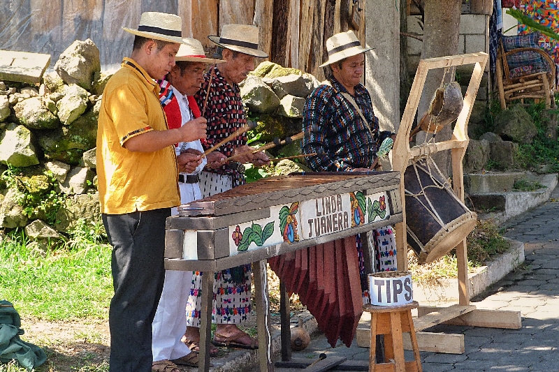 Drei Musiker in Livingston, Guatemala